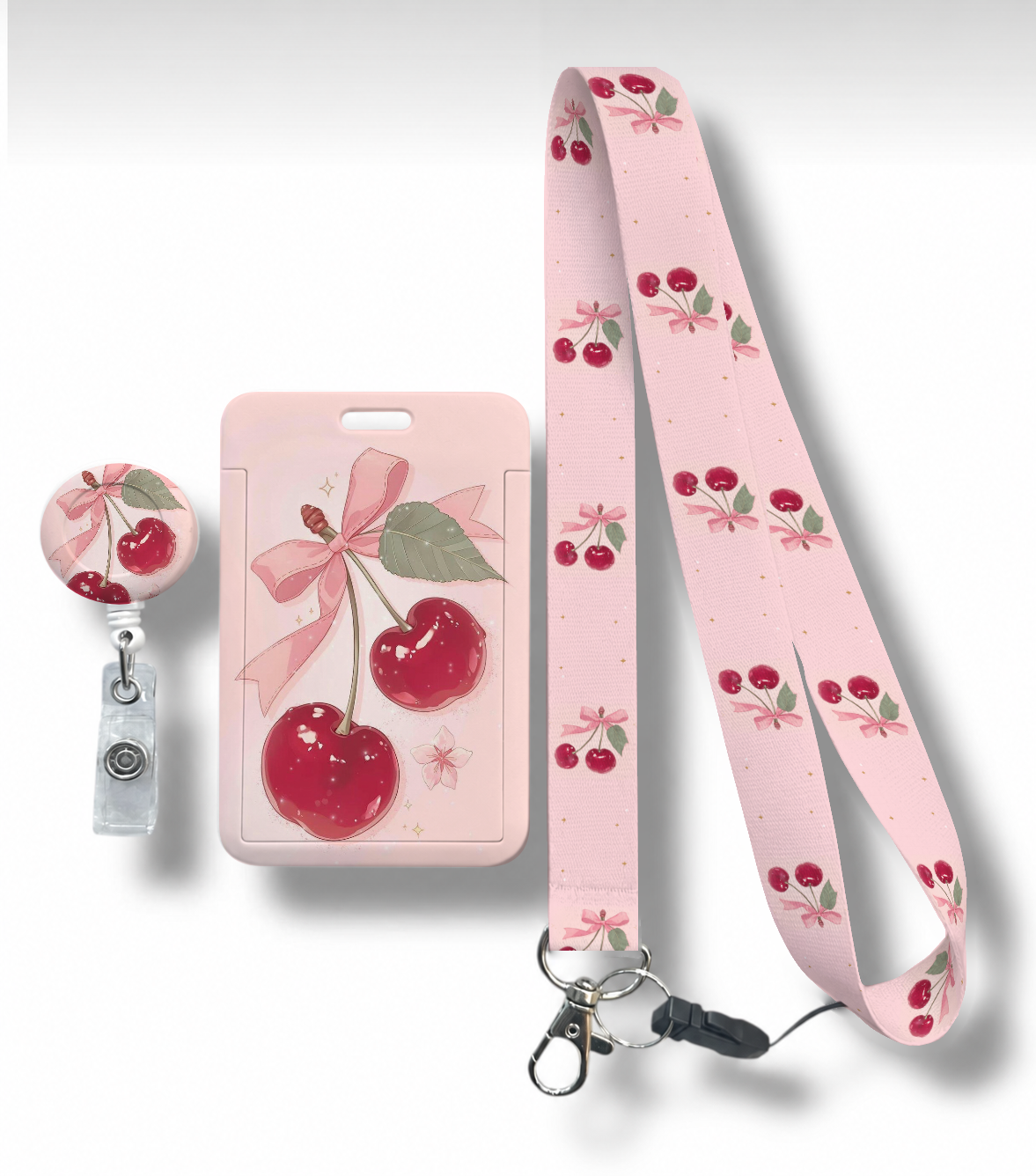 Pembe Fiyonk ve Kiraz desenli RoyalVance yoyo, boyun askı ipi ve sürgülü kartlık 3’lü set